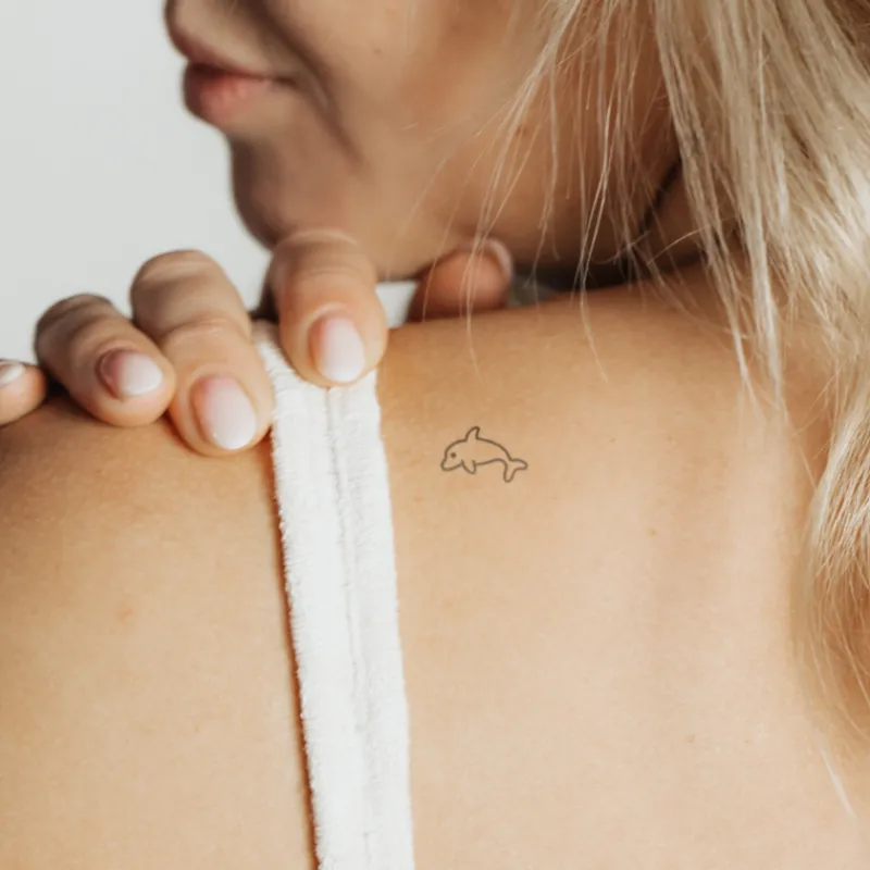 Tatouages Petit | Tatouages Petit^PAUL HEWITT Dolphin Tattoo